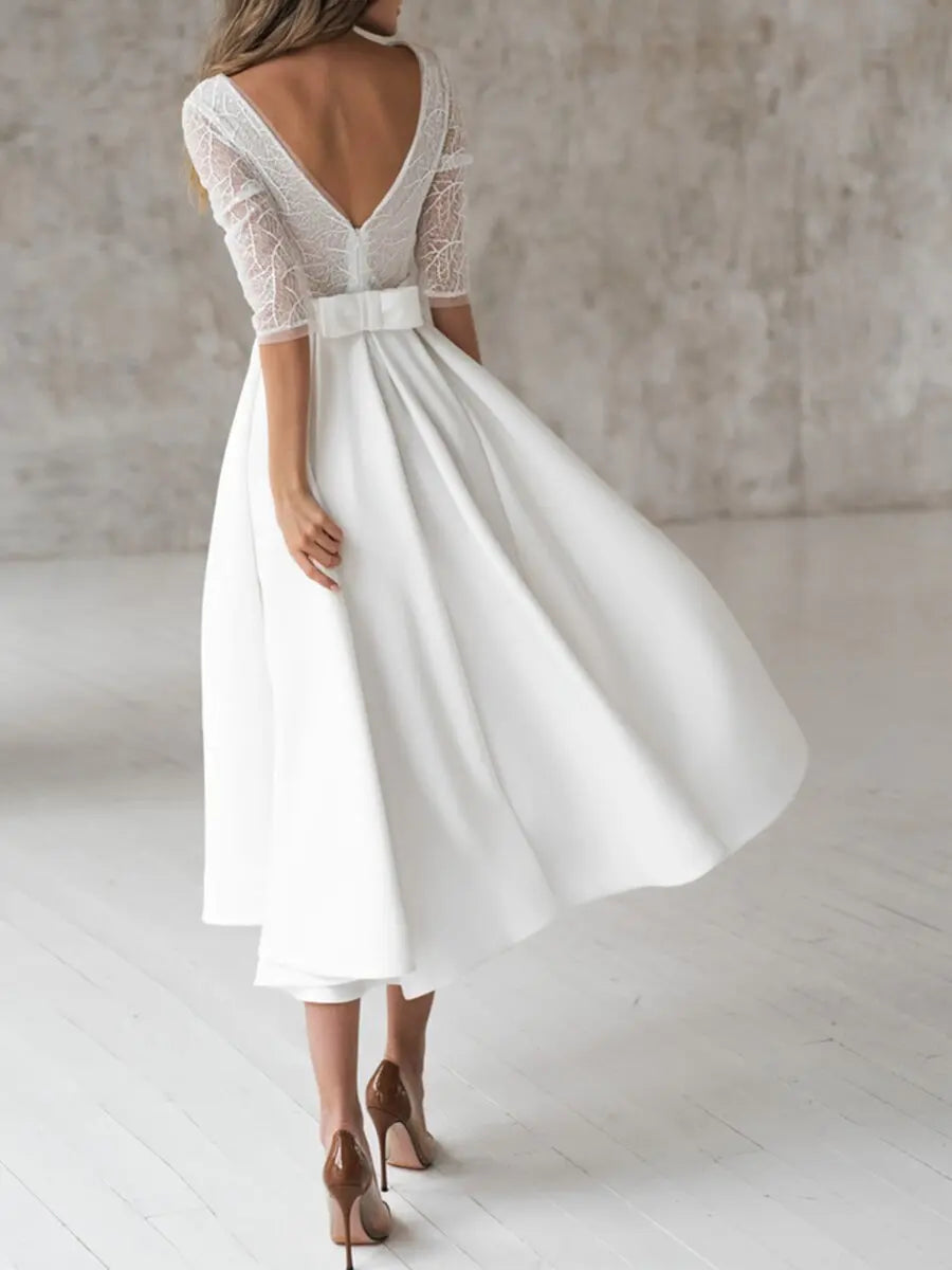 White Long-sleeved V-neck Backless Big Swing Knee Length Dress